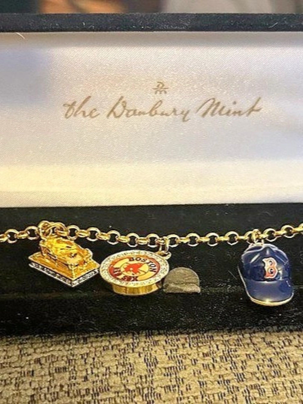 The DanburyMintCharm Bracelet in Gold & Blue Like New